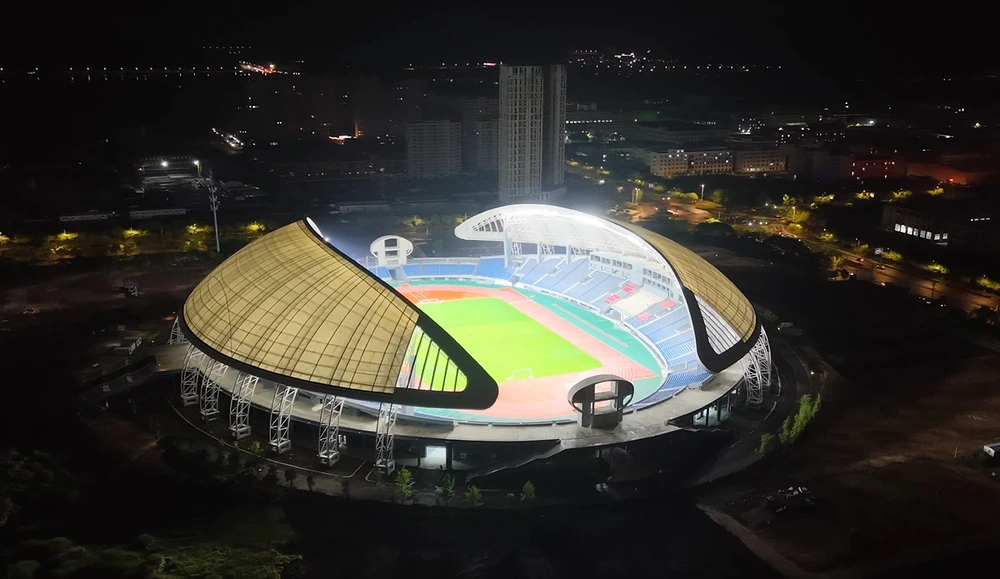 Jinlin Sports Center: installed stadium lighting at night