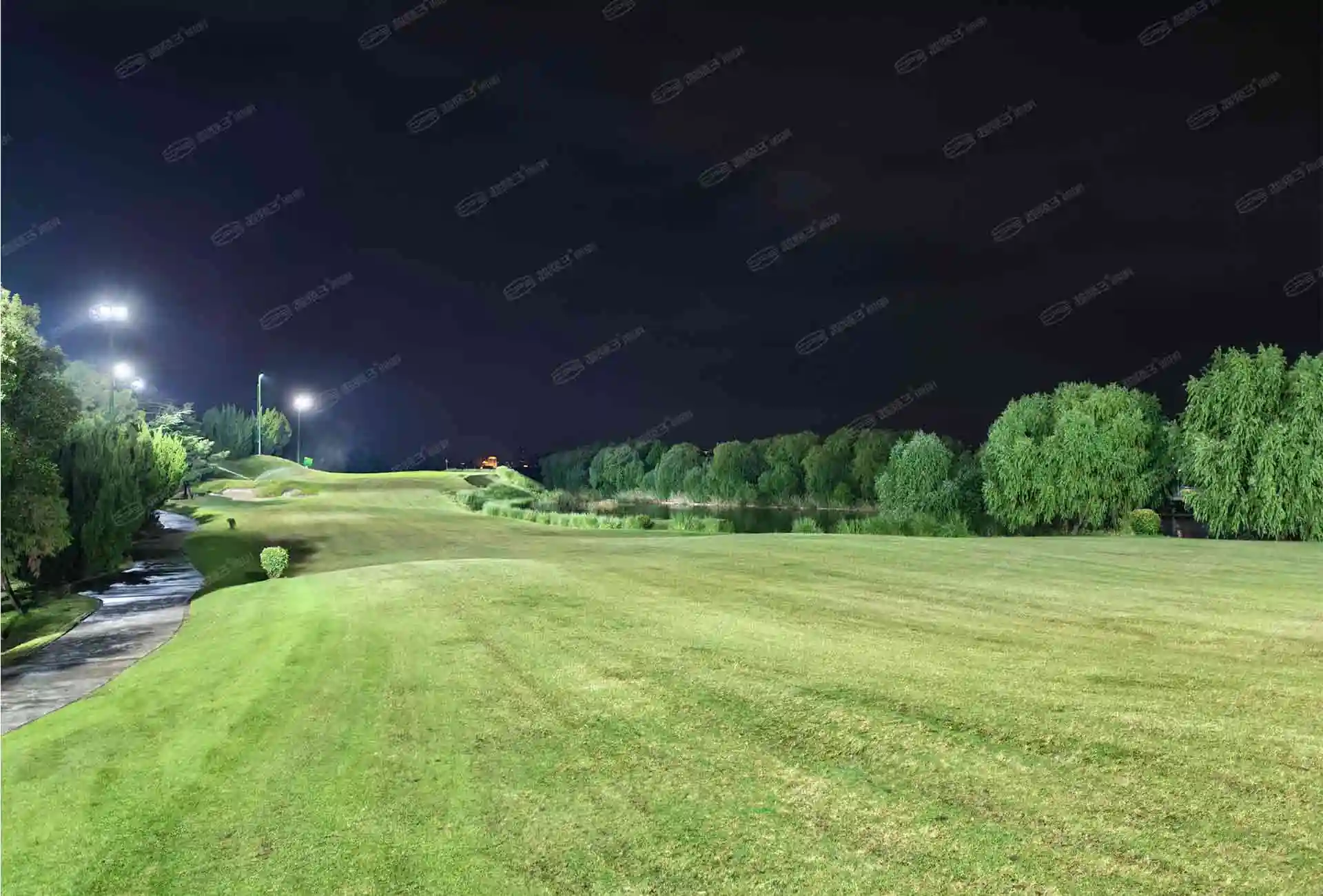 Suzhou golf course: illuminated fairway after dark